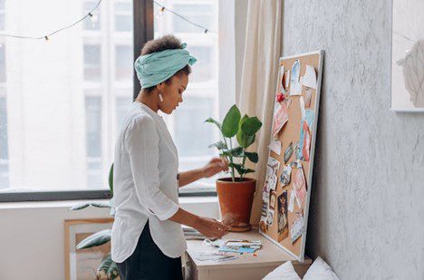 Woman looking at image for vision board