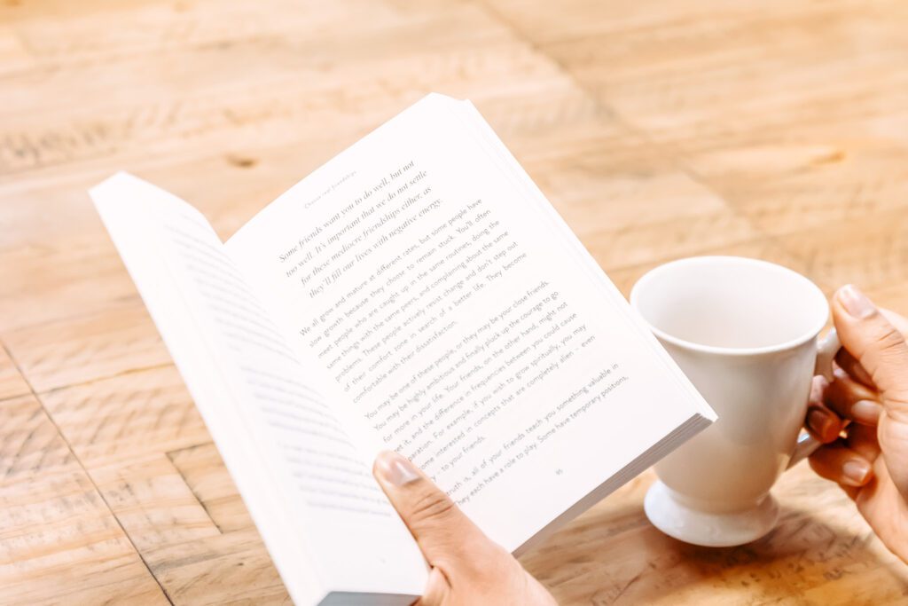 Hand holding a book
