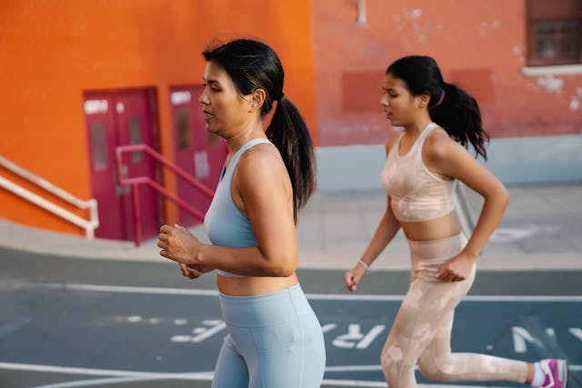 Mother and daughter jogging