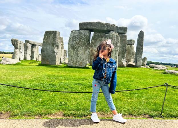 Melissa's daughter in front of the Stonehenge landmark