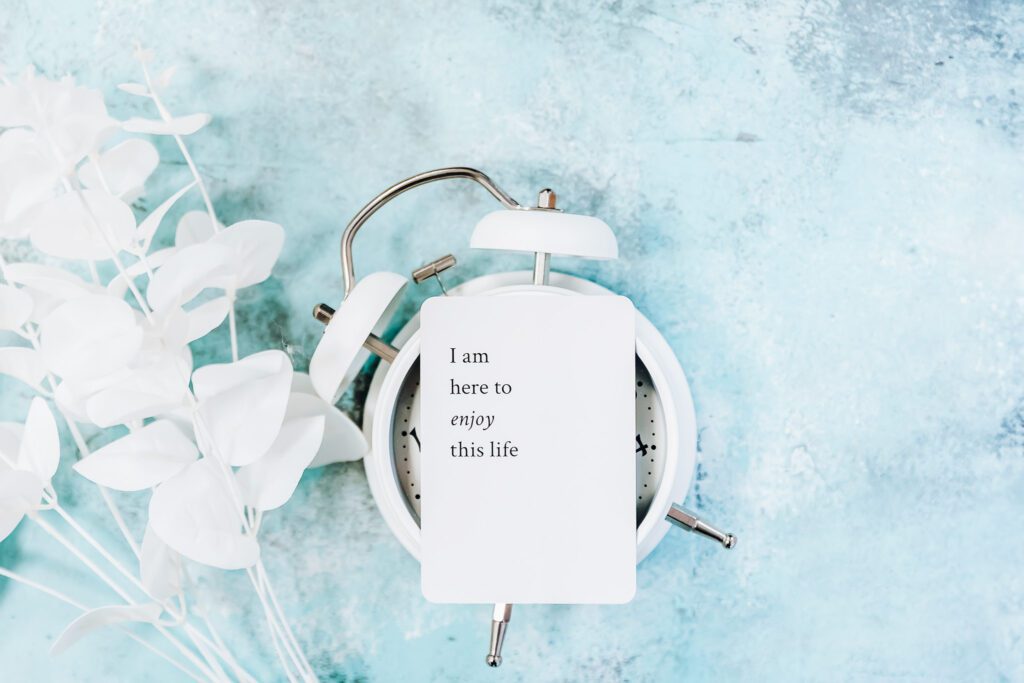 Motivational quote on top of a clock