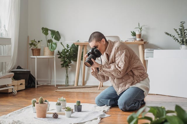 Woman photographing plants