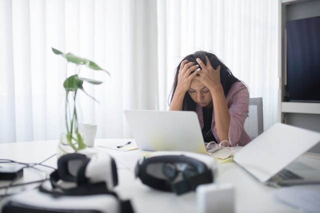 Woman stressed in her office