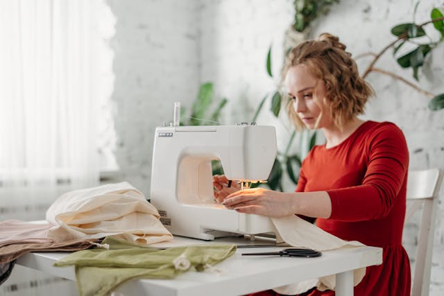 Woman using a sewing machine