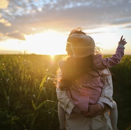 Mother and daughter in nature