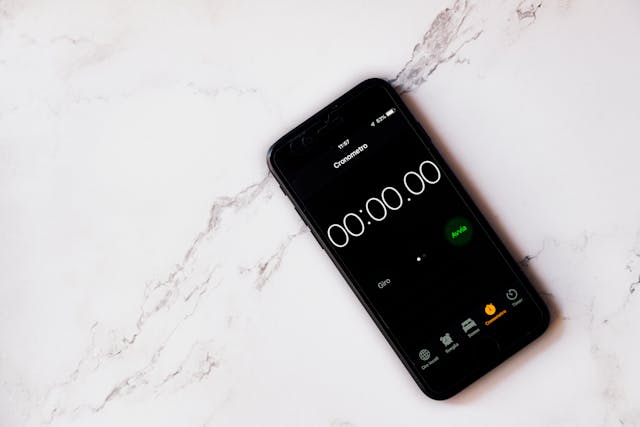 Cellphone with stopwatch on screen