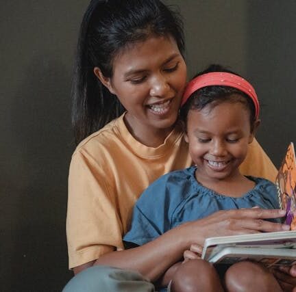 Mother and daughter reading