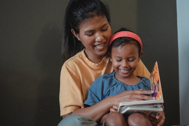 Mother and daughter reading