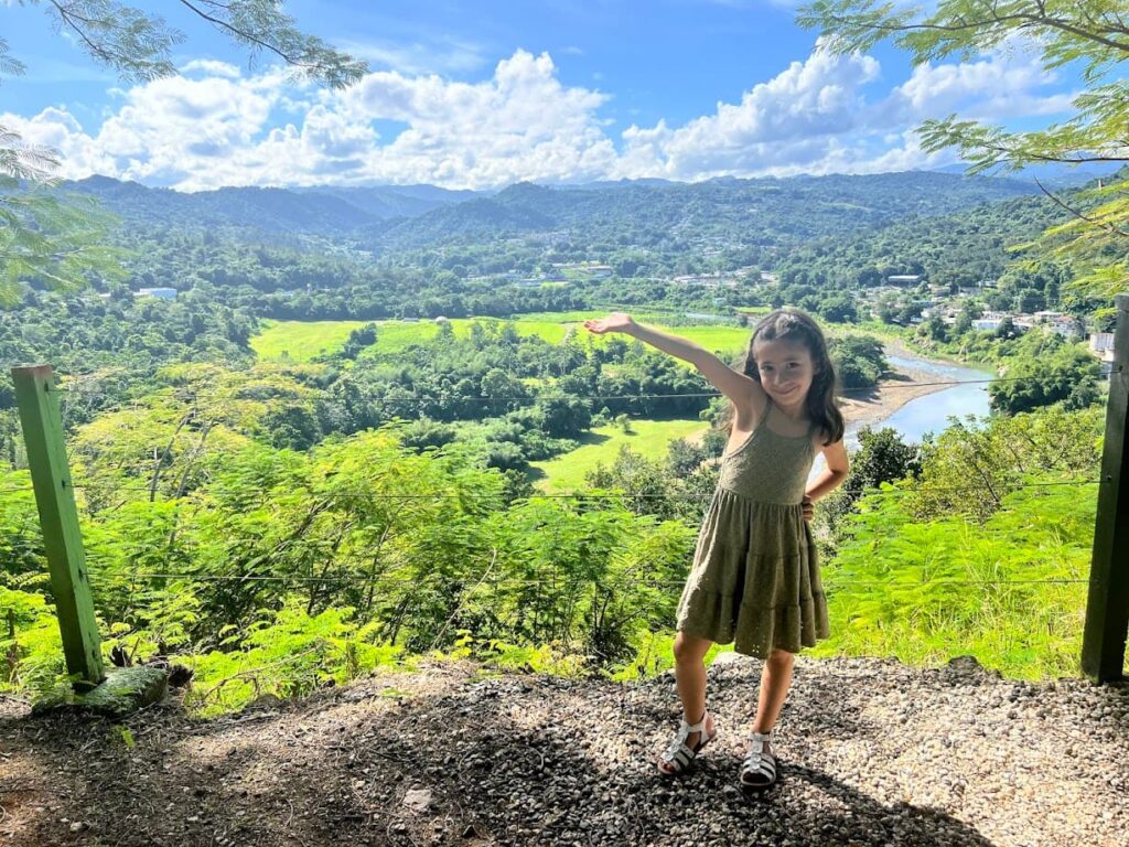 Melissa's daughter with greenery in the background
