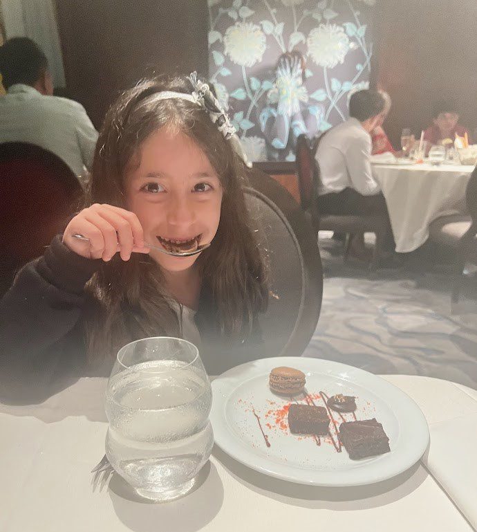 Melissas daughter eating dessert