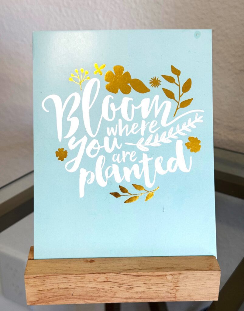 Positive card on wooden stand