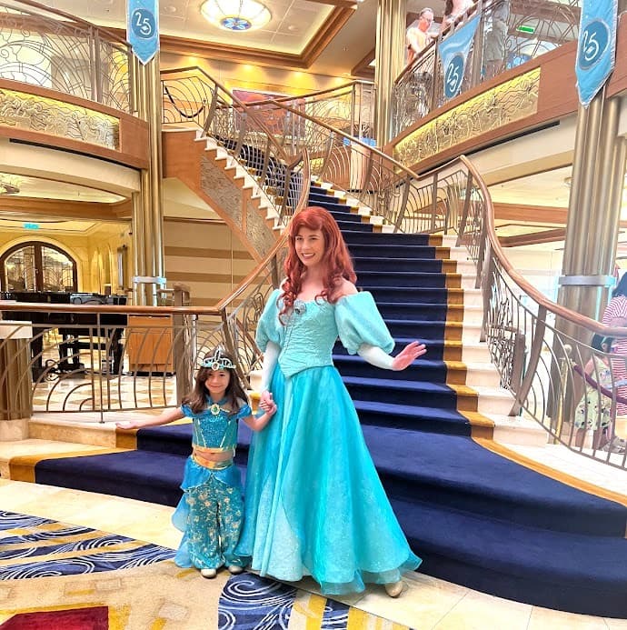 Melissas daughter posing with a Disney princess