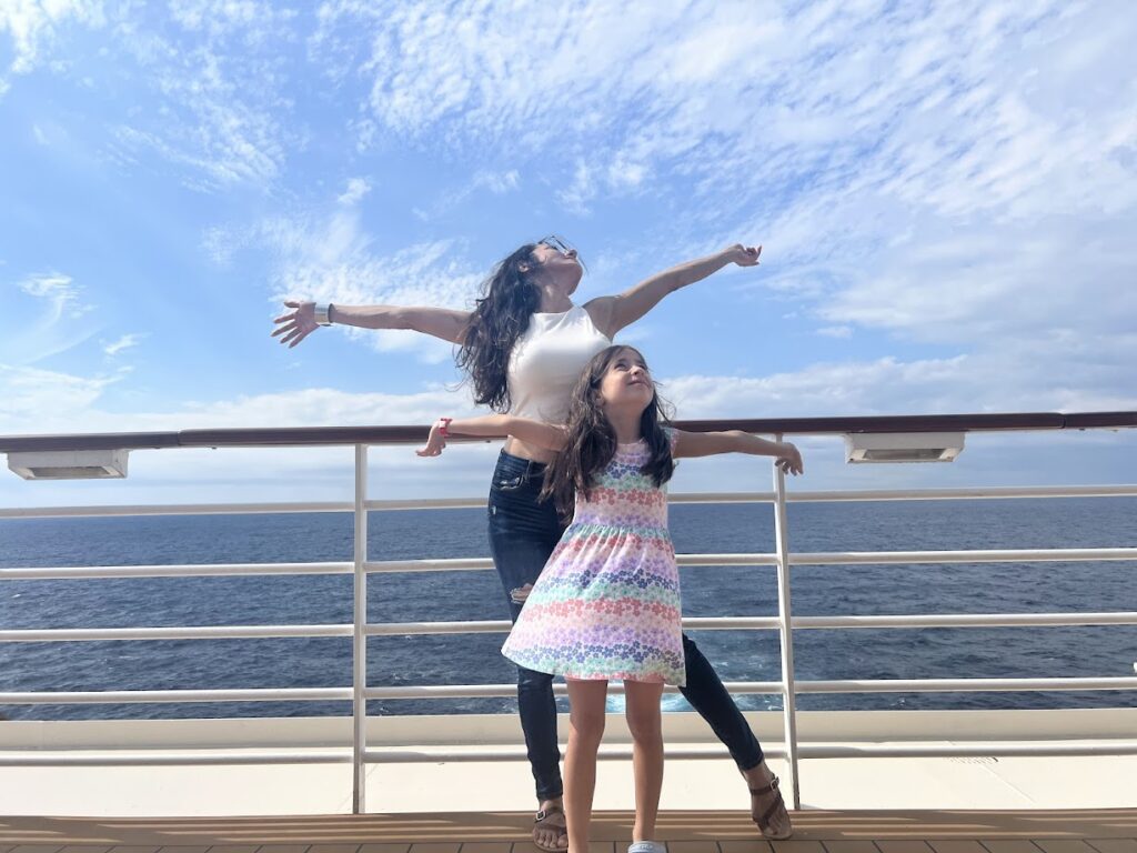Melissa and her daughter recreating the Titanic scene