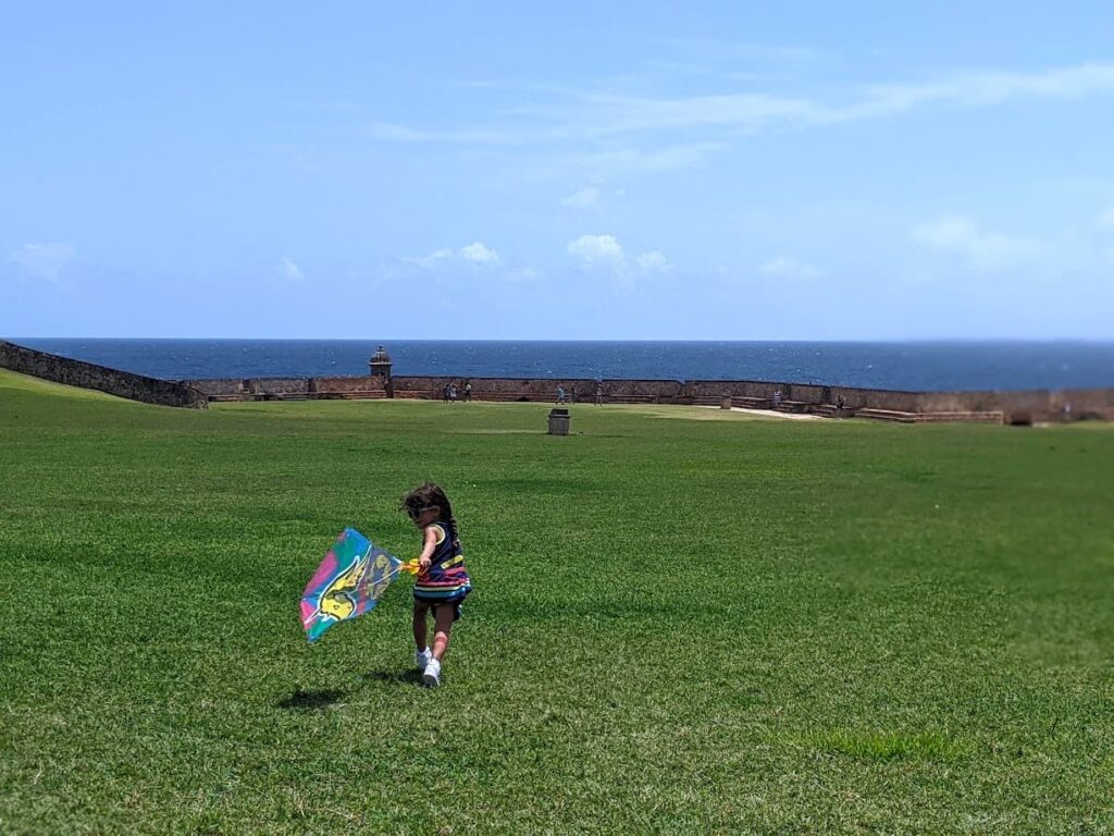 Melissa's daughter flying a kite in El Morro