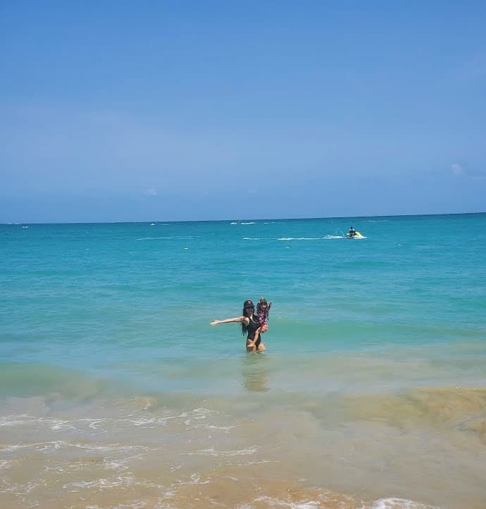 Melissa and daughter at the beach