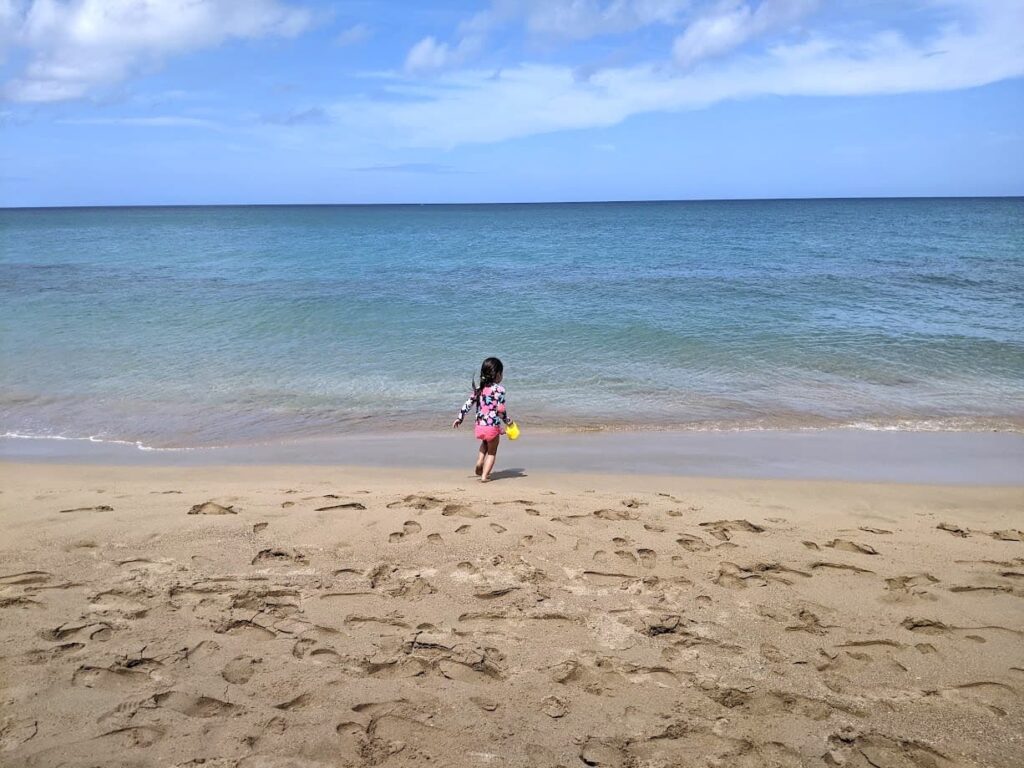 Melissa's daughter running towards the beach
