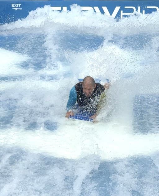 Melissas husband on the FlowRider