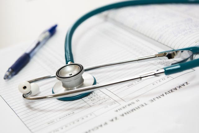 Stethoscope on record sheet