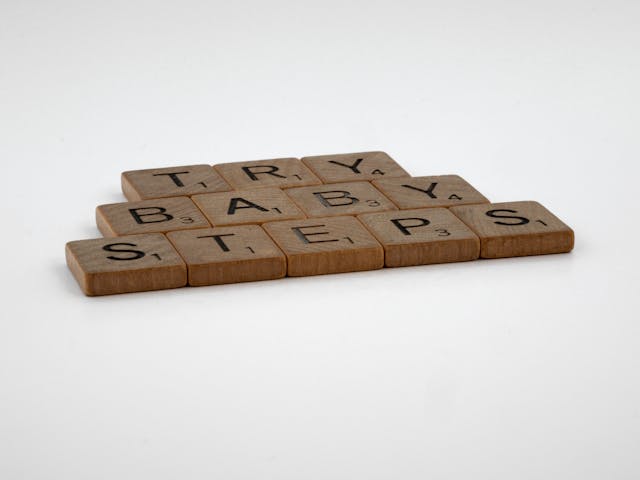Motivational quote reading ‘Try baby steps’