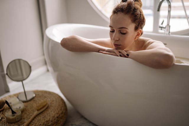 Woman relaxing in tub