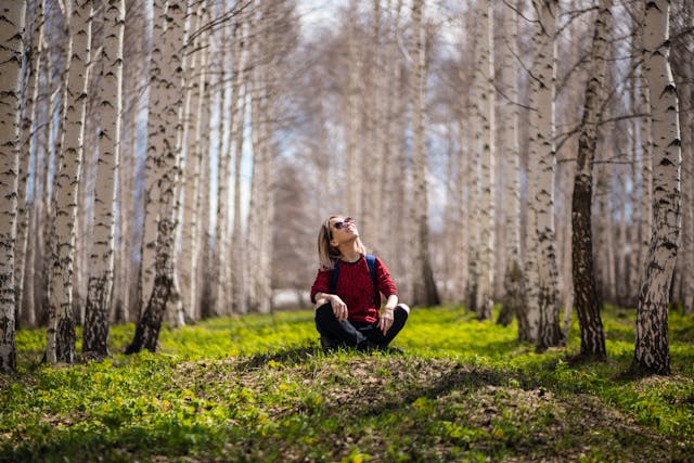 Woman sitting in nature