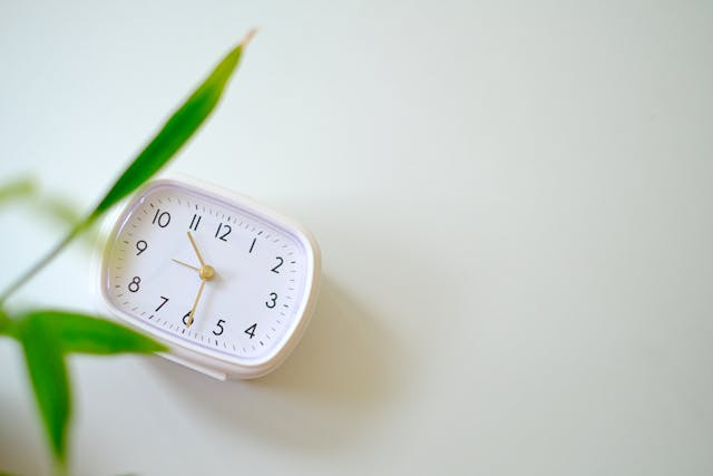 White clock on a white background